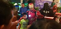 The kids enjoy photo moments with Ironman